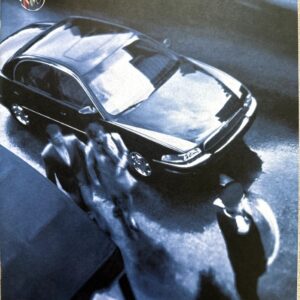 Front cover of a 1999 Buick Park Avenue brochure showing a dark sedan from above with people at the curb.