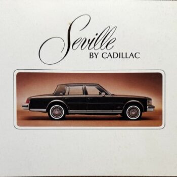 Cover of a Seville by Cadillac brochure showing a black Cadillac Seville in a rounded-rectangle photo frame.