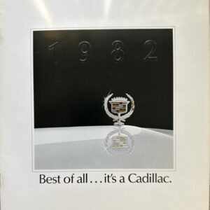 Cadillac emblem on a reflective surface with '1982' above, captioned 'Best of all ... it's a Cadillac.'