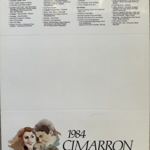 Page from a 1984 Cimarron brochure showing 'Standard Features' in column lists with a bottom illustration promoting exterior colors (couple and car).