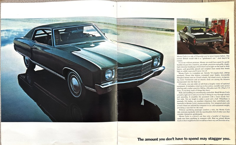 IMG_5888 | Merrick Auto Museum Two-page vintage car advertisement showing a teal classic convertible on a coastal road, with a smaller inset image and text panel; bottom tagline reads, 'The amount you don’t have to spend may stagger you.'