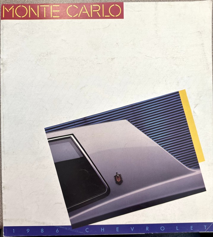 IMG_6116 | Merrick Auto Museum Retro poster showing a silver Chevrolet Monte Carlo rear quarter panel angled on a blue striped background, with MONTE CARLO title at the top.