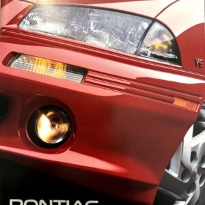 Close‑up of a red Pontiac front end showing the headlight, bumper, and wheel with the slogan 'Pontiac 1994. We are driving excitement.'