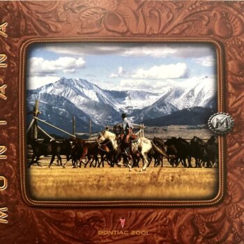 Rider on horseback leads a herd of horses across a field with snow‑capped mountains in the background, framed by a decorative brown border that reads 'Montana'.
