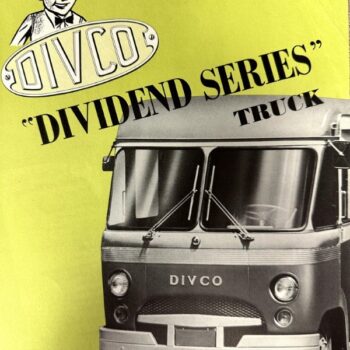 Vintage Divco Dividend Series truck ad with a grey front-view truck on a bright yellow background and a cartoon driver logo.