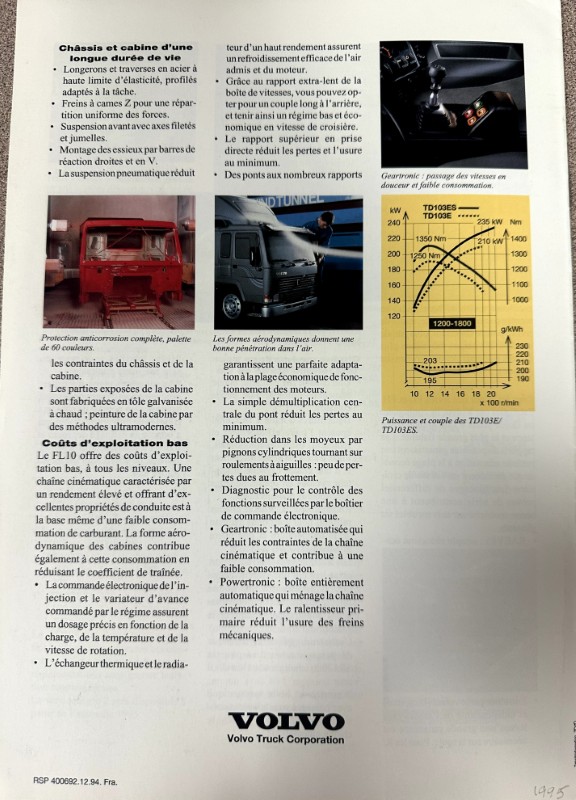 IMG_8678 | Merrick Auto Museum Page from a Volvo Truck brochure with French technical notes, small images of truck chassis, a blue truck component, a yellow performance graph, and the Volvo logo at bottom.