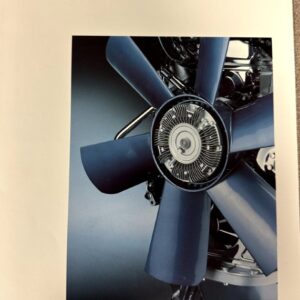 Close-up of a blue ship propeller with engine components in the background, on a brochure page labeled Moteur D12A by Volvo.