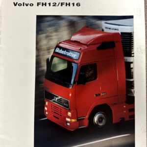 Red Volvo FH12/FH16 semi-truck on a highway with a white trailer, seen from a high-front angle, logo and model text visible on the cab and box background showing Volvo branding.