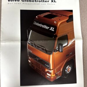 Orange Volvo Globetrotter XL truck brochure featuring a close-up of the cab, with Volvo logo on the bottom right and 'Globetrotter XL' text on the windshield top edge.