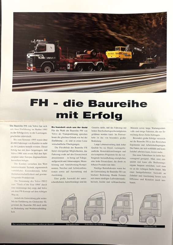 IMG_8699 | Merrick Auto Museum Advertisement page showing a heavy tow truck on a highway, hauling a trailer with construction machinery; headline reads 'FH - die Baureihe mit Erfolg'.