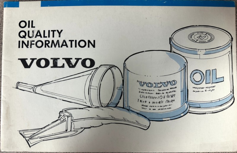IMG_8700 | Merrick Auto Museum Illustration showing Volvo oil products—two oil cans, a filter, and a funnel with the text 'OIL QUALITY INFORMATION'.