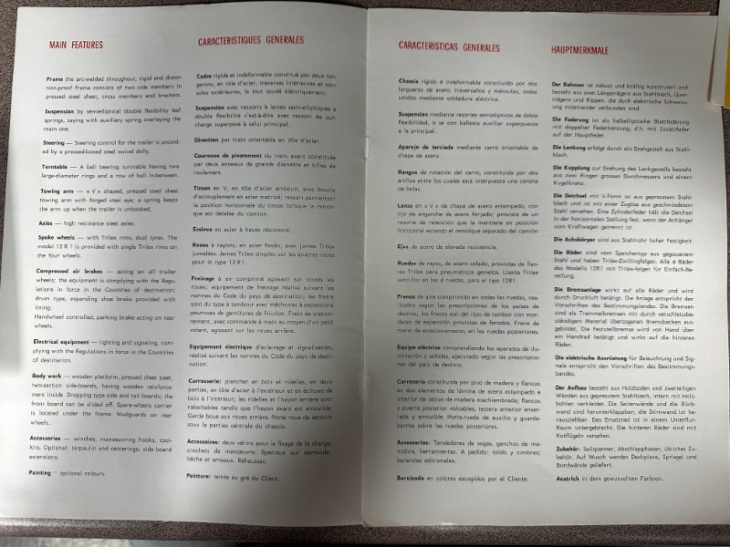 IMG_8719 | Merrick Auto Museum Open two-page manual spread titled 'Main Features' in English, French, and German, listing components like frame, suspension, steering, and brakes for a vehicle.
