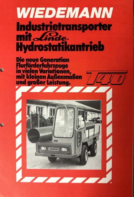 IMG_8735 | Merrick Auto Museum Red promotional poster for Wiedemann industrial transporter with Linde hydrostatic drive; features a black-and-white photo of a compact front-end truck (T40).