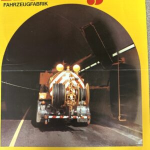 Yellow Zellinger brochure cover showing a tunnel washing and sewer cleaning machine inside a tunnel, with multilingual captions at the bottom.
