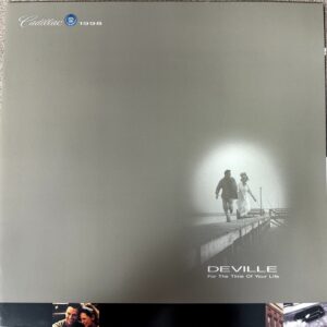 Cadillac DeVille brochure cover with a couple walking on a foggy pier; Cadillac logo, 1998, and the tagline 'For The Time Of Your Life'.