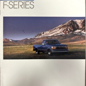 Ford F-Series '93 brochure cover featuring a blue pickup truck parked on a grassy plain with snow-capped mountains in the background
