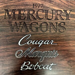 Wooden plaque listing 1977 Mercury Wagons models: Cougar, Marquis, Bobcat (script fonts)