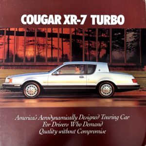 Cover of a brochure advertising the Cougar XR-7 Turbo, showing a silver two-door coupe in front of a red-brown background with bold title text above and a script slogan below.