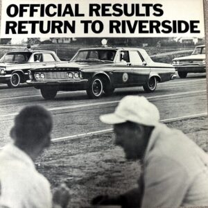 Black-and-white photo of vintage cars driving on a road with spectators in the foreground and a bold banner reading 'Official Results Return to Riverside' above.