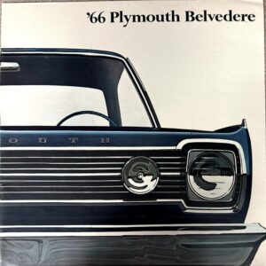Front view of a blue 1966 Plymouth Belvedere with chrome grille and round headlight, seen from the passenger side.