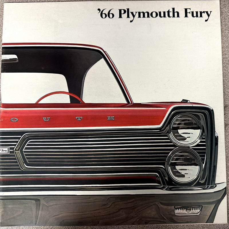 IMG_9175 | Merrick Auto Museum Promotional image of a red ’66 Plymouth Fury showing the front grille and round headlights with a vintage car poster look.