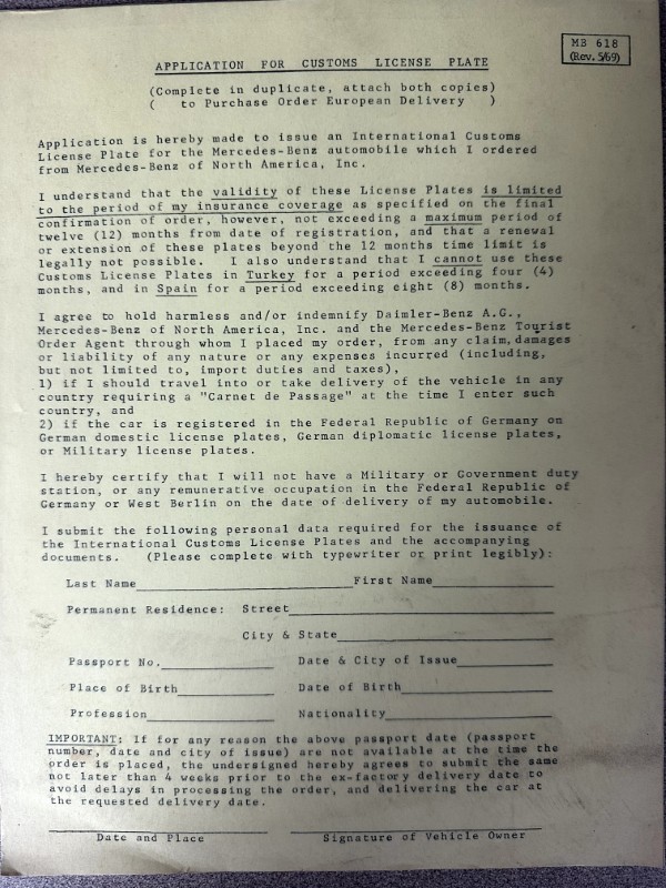 IMG_9331 | Merrick Auto Museum Vintage government form titled 'Application for Customs License Plate' with fields for name, address, passport, and signature lines (black-and-white scan).
