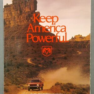 Vintage Dodge ad poster with a desert road and a red pickup, featuring the bold orange slogan 'Keep America Powerful'.