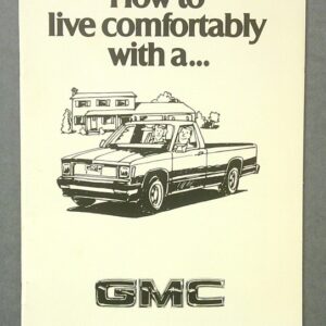 Cover of a GMC brochure: title 'How to live comfortably with a…', line drawing of a pickup truck with a house in the background, GMC logo below.