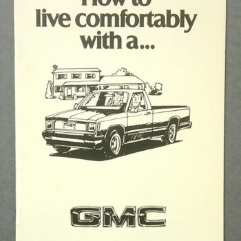 Cover of a GMC brochure: title 'How to live comfortably with a…', line drawing of a pickup truck with a house in the background, GMC logo below.