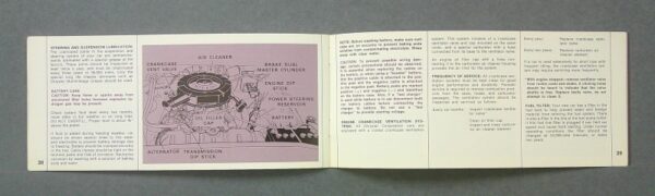 69Imperial4 Custom | Merrick Auto Museum Open service manual showing a purple engine diagram spanning two pages with labeled parts (air cleaner, crankcase vent valve, oil filler, alternator, transmission, dip stick) and accompanying text blocks.