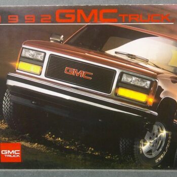 1992 GMC Truck brochure cover showing a brown pickup at an angle with the GMC emblem on the grille in focus.