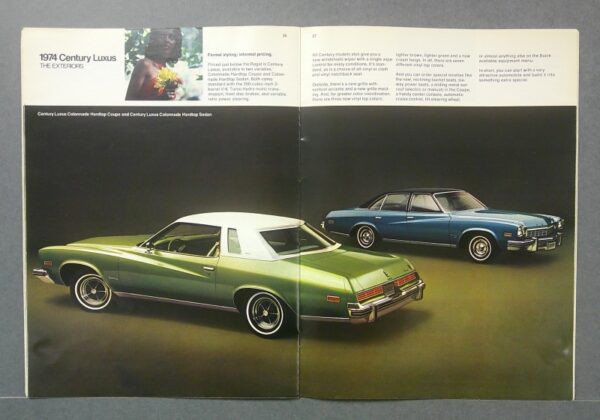 Buick3 Custom | Merrick Auto Museum Two vintage 1970s luxury cars on a magazine spread: a green hardtop coupe in the foreground and a blue sedan in the background on a dark studio backdrop.