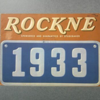 Rockne magazine cover with an oversized blue 1933 license plate image on an orange header background.