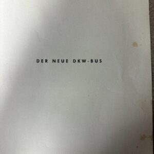 Page displaying the title 'DER NEUE DKW-BUS' with a small blue Auto Union logo in the top-right corner.