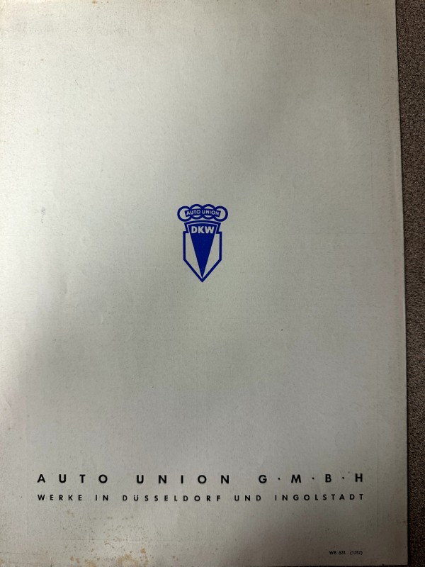 IMG_9503 | Merrick Auto Museum Vintage Auto Union document cover with blue emblem centered and small text at the bottom reading 'WERKE IN DÜSSELDORF UND INGOLSTADT'