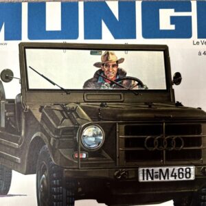 Front view of a dark green vintage four‑wheel drive utility vehicle with a smiling man in a hat driving, on a French magazine cover.