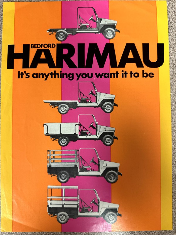 IMG_9602 | Merrick Auto Museum Poster advertising Bedford Harimau utility trucks, with a pink vertical stripe and the slogan 'It's anything you want it to be' alongside multiple small vans lined down the stripe.