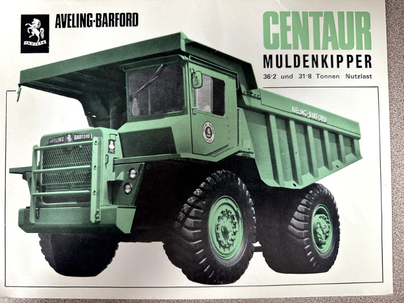 IMG_9640 | Merrick Auto Museum Vintage green Aveling-Barford Centaur dump truck advertisement, shown from front-left with bold CENTAUR MULDENKIPPER text above it.