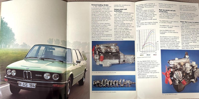 IMG_9656 | Merrick Auto Museum Open magazine spread featuring a green BMW 525 on a grassy field on the left and engine diagrams and photos on the right.