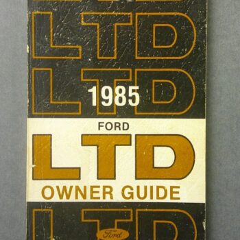 LTD1 Custom | Merrick Auto Museum 1985 Ford LTD owner’s guide booklet with bold LTD lettering on a black cover and a white band reading 'LTD Owner Guide'