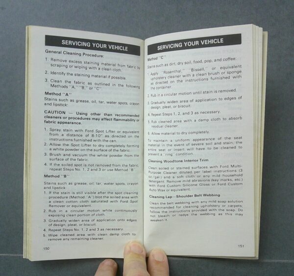LTD4 Custom | Merrick Auto Museum Open service manual showing two pages titled 'Servicing Your Vehicle' with cleaning procedures and steps printed in two columns.