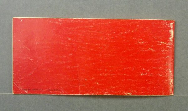 camion5 Custom | Merrick Auto Museum Red, weathered rectangular panel or card with chipped edges on a gray background.